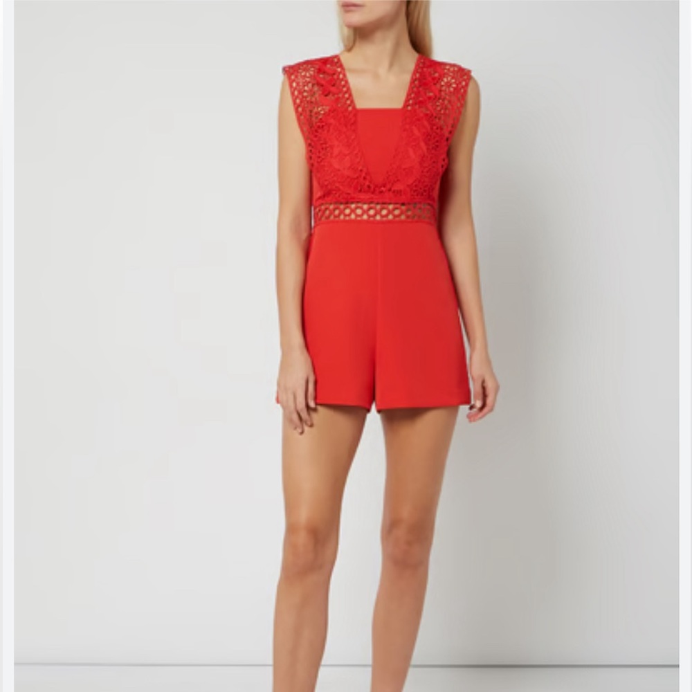 Explosion Brand, Red Jumpsuit with lace straps. US 4.